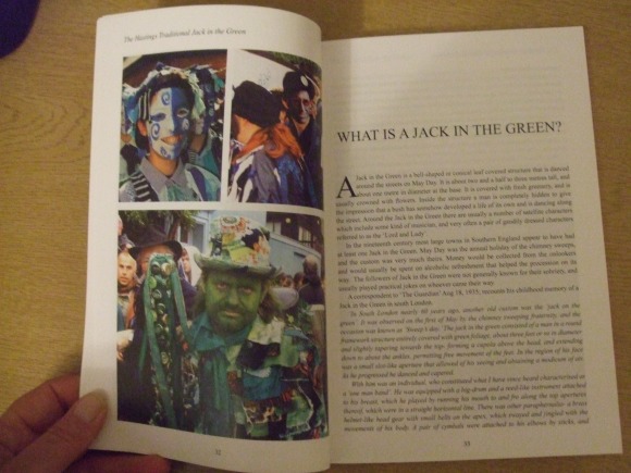 Pages of the book showing characters in the parade, and text 'what is Jack in the Green?'