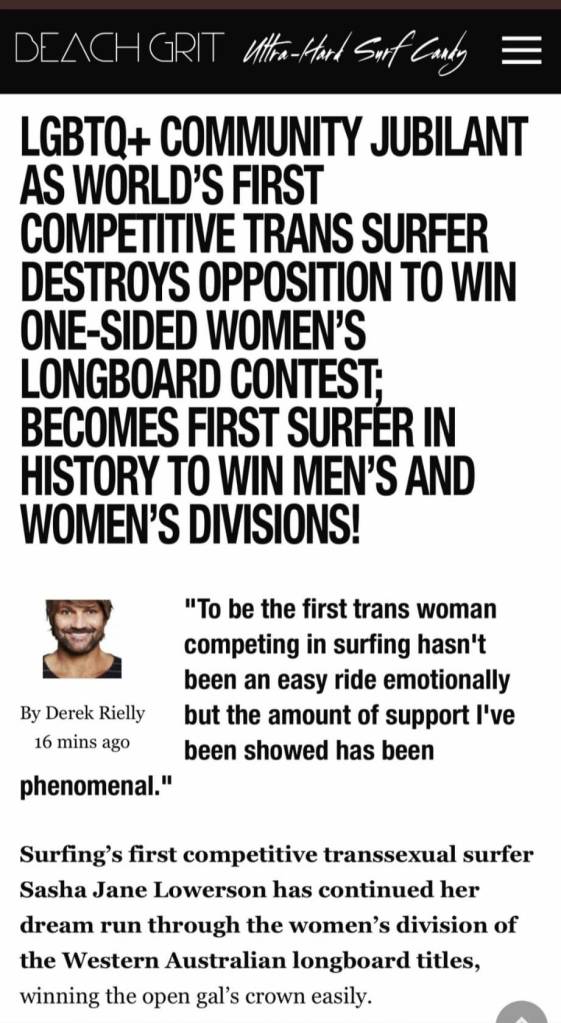 Website headline: LGBTQ+ COMMUNITY JUBILANT AS WORLD'S FIRST COMPETITITVE TRANS SURFER DESTROYS OPPOSITION TO WIN ONE-SIDED WOMEN'S LONGBOARD CONEST: BECOMES FIRST SURFER IN HISTORY TO WOMN MEN'S AND WOME'S DIVISIONS!